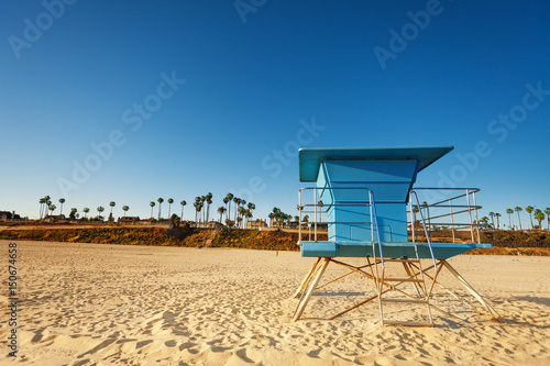 Closed lifeguard tower on deserted sandy beach