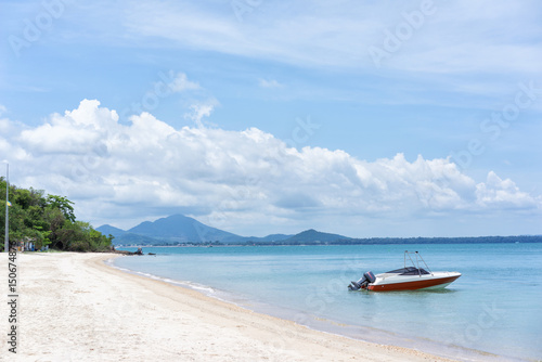 Paradise Beach at the Tropical Island, Boat and blue sky