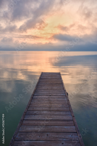 Fototapeta Naklejka Na Ścianę i Meble -  wooden pier in the sunset