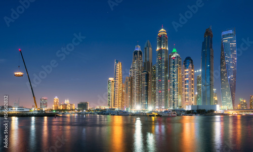 Dubai Marina waterfront from offshore at blue hour. May 2017