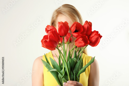 Beautiful young woman with ...