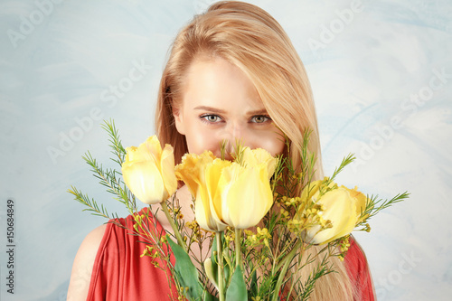 Beautiful young woman with ...