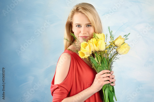 Beautiful young woman with ...