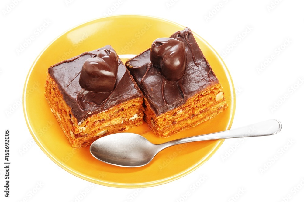 Chocolate cakes on orange plate