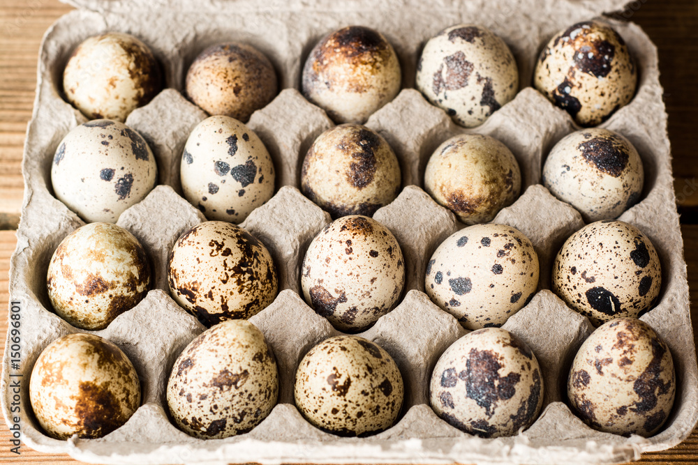 Quail eggs in cardboard packaging. Quail eggs in cardboard packaging.