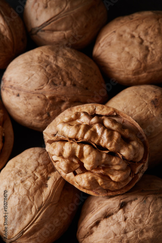 Macro close-up crop of walnuts as food backdrop composition