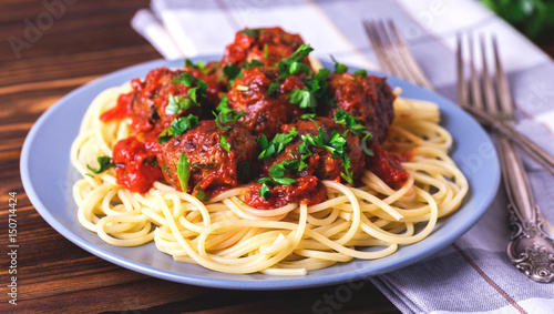 Traditional Italian spaghetti pasta with beef meatballs