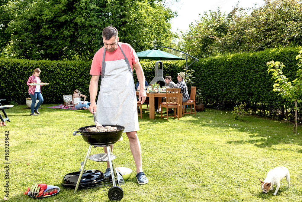 Grillparty im Garten StockFoto Adobe Stock
