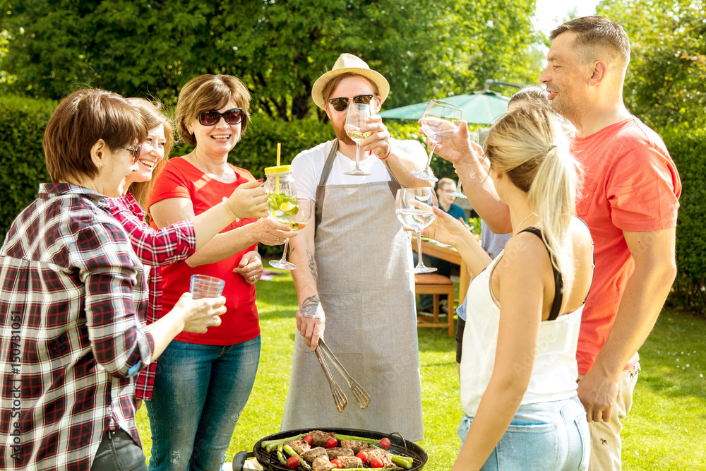 Grillparty im Garten StockFoto Adobe Stock