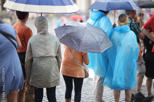 Photography People with umbrellas in the rain in St