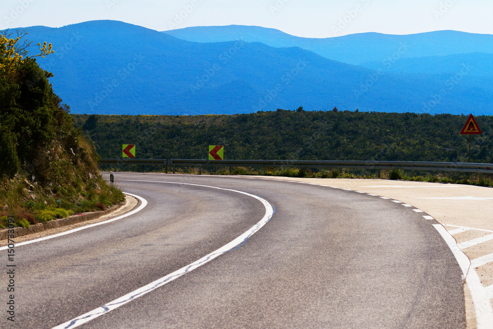 Road left bend in Croatia, with a copy-space.