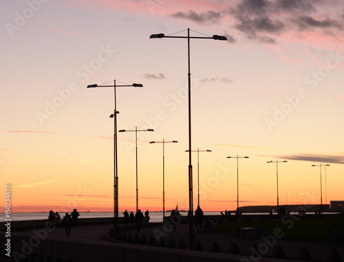 Silhouettes of lanterns at sunset. © konstan