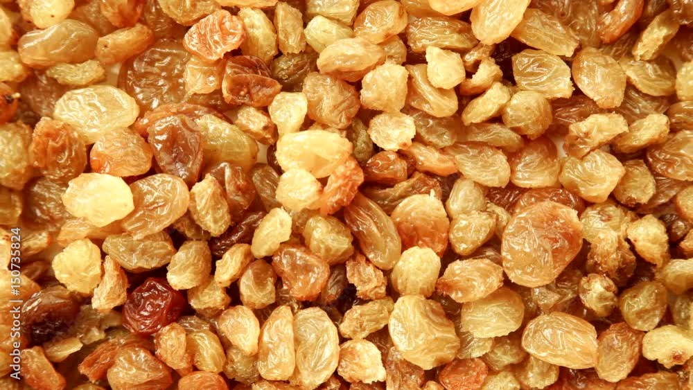 Raisin dried grape as background texture. Healthy food organic nutrition. Dolly slider shot 4K ProRes HQ codec Raisin dried grape as background texture. Healthy food organic nutrition. Dolly slider shot 4K ProRes HQ codec