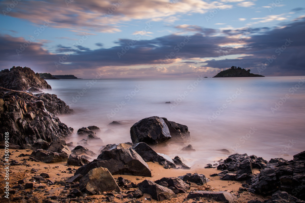 Long Exposure of Sunrise at Te Ngaere Bay, Northland, New Zealand, Selective Focus Long Exposure of Sunrise at Te Ngaere Bay, Northland, New Zealand, Selective Focus