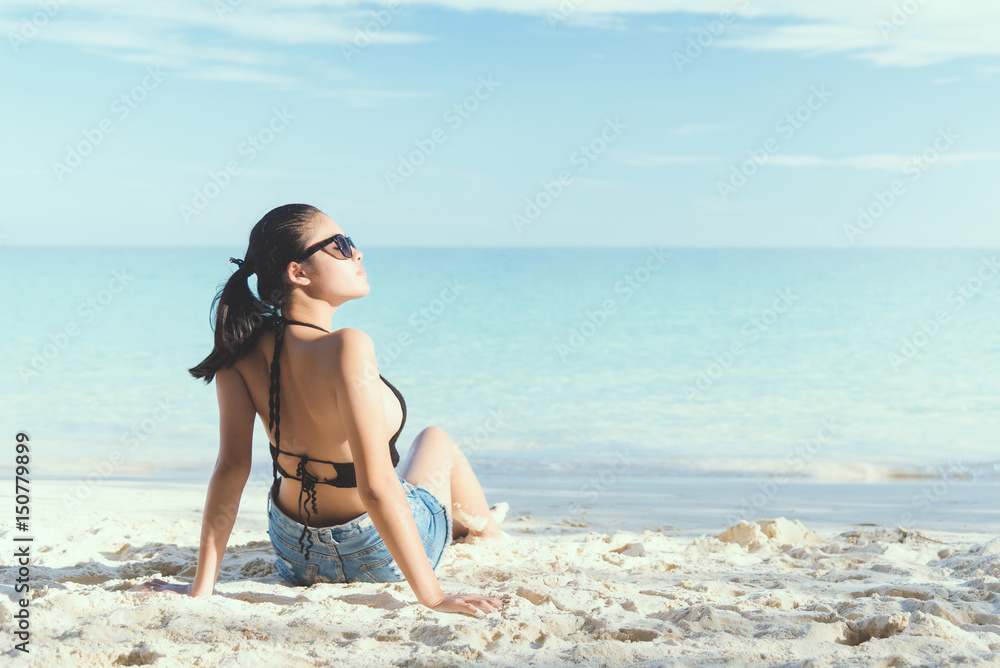 Young fashion woman relax on the beach. Young fashion woman relax on the beach.