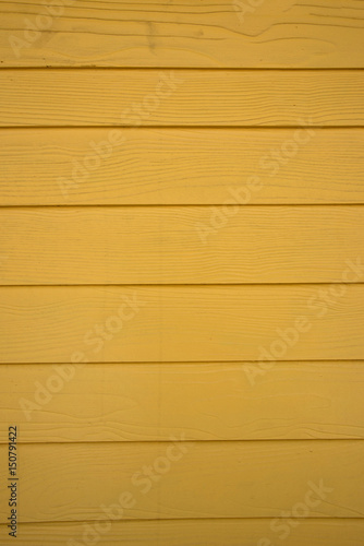 Yellow wood wall background or wall paper 