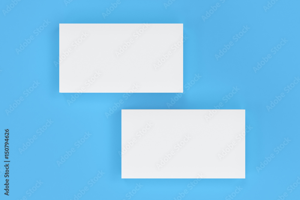 White blank business cards mock-up on blue background White blank business cards mock-up on blue background