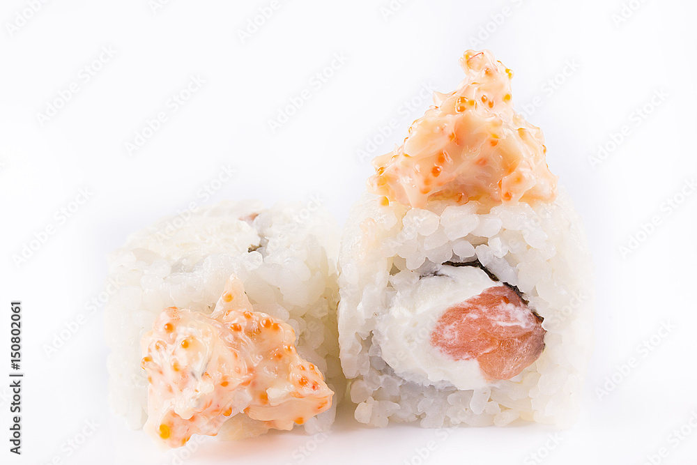 japanese Cuisine, Sushi Set: roll with salmon, shrimp, cream cheese, tobiko caviar, Japanese mayonnaise on a white background.