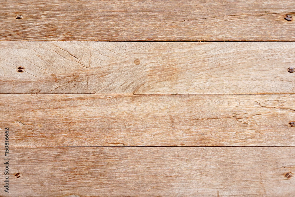 Naklejka premium Drewniane deski brązowe tło tekstura