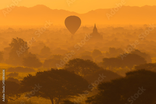 Beautiful silhouette landscape view of sunrise morning in Bagan, an ancient city located in the Mandalay Region of Myanmar.