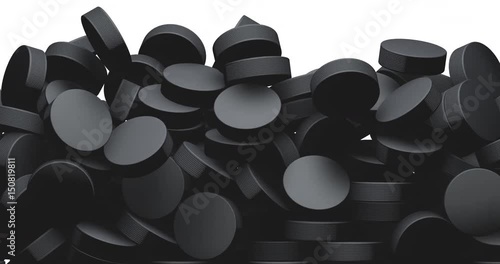 Falling ice hockey pucks / 3D animation of hockey pucks filling screen