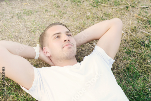 Man relaxing on the grass.