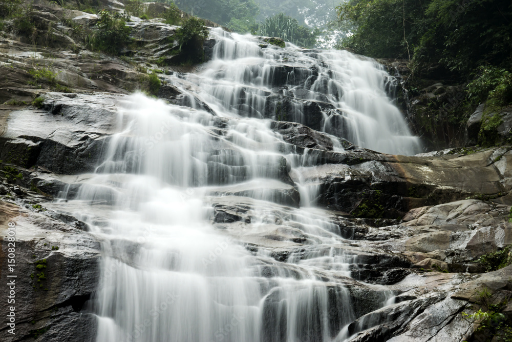 Waterfall and stone in the rain-forest. Waterfall and stone in the rain-forest.