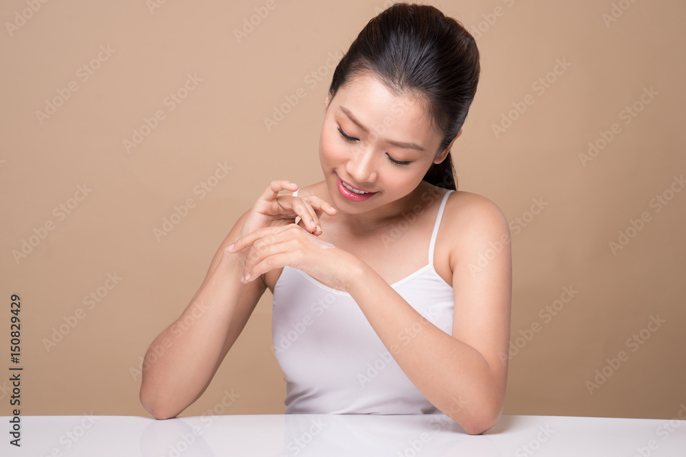 Clean fresh skincare concept. Young asian woman touching enjoying hand skin. Clean fresh skincare concept. Young asian woman touching enjoying hand skin.