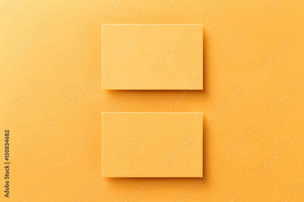 Mockup of two horizontal business cards at golden foil paper background. Mockup of two horizontal business cards at golden foil paper background.