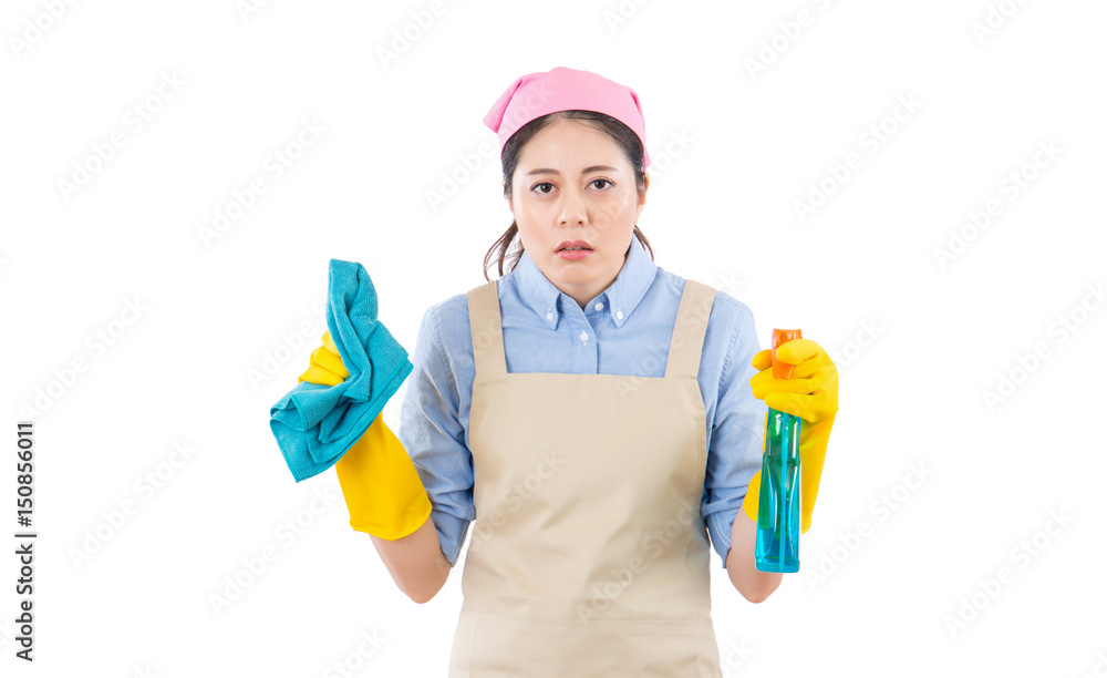 Tired attractive young woman in yellow gloves Tired attractive young woman in yellow gloves