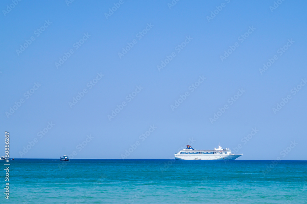 Large luxury motor yacht on a tropical sea