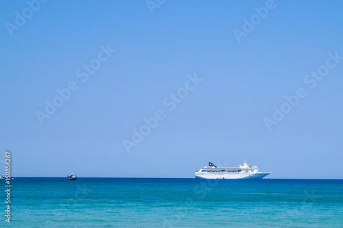 Large luxury motor yacht on a tropical sea © supatthanan