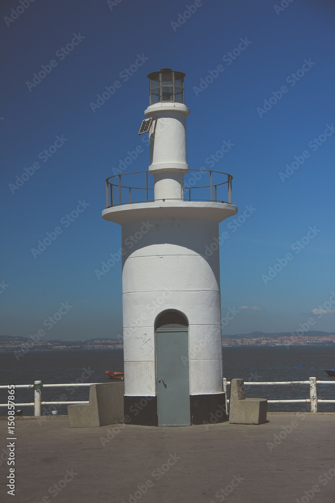 Lighthouse with the blue sky in background. Alcochete, Portugal Lighthouse with the blue sky in background. Alcochete, Portugal