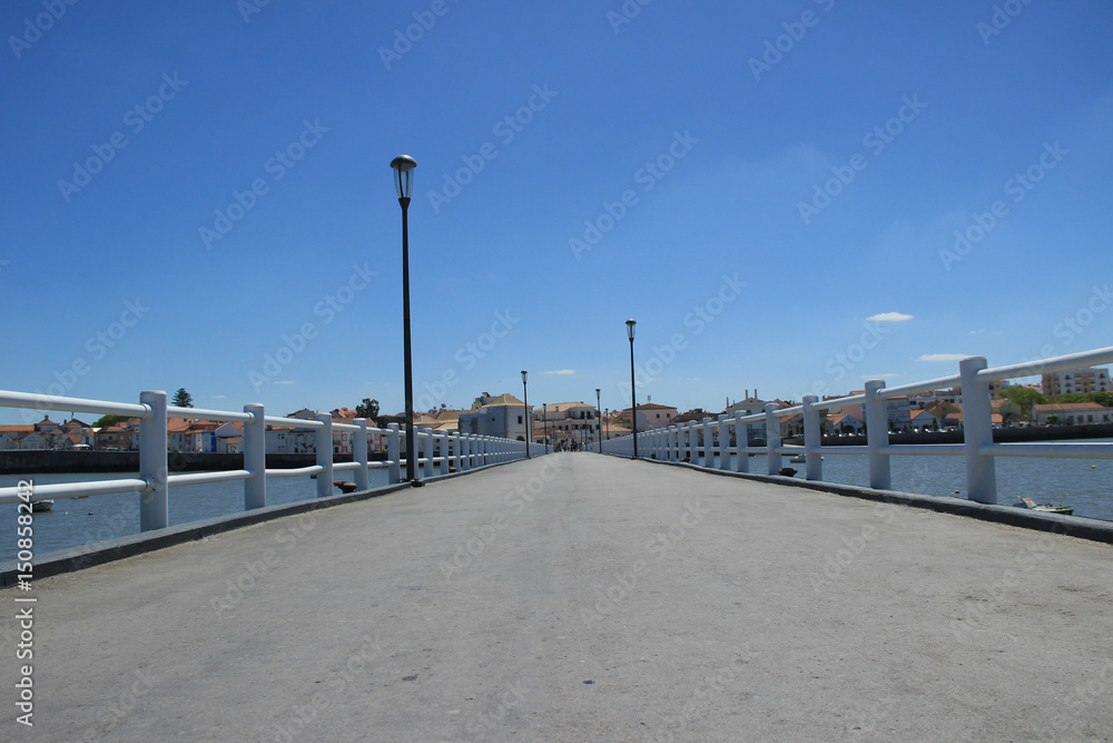 Pier from Alcochete surrounded by the Tagus river. Alcochete, Portugal 