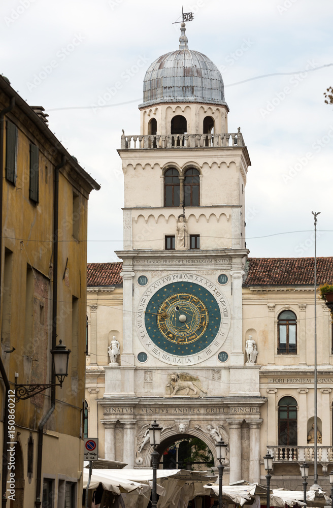 Clock tower building of medieval origins overlooking Piazza dei Signori in Padova, Italy