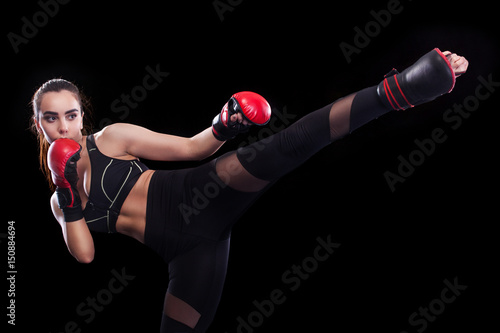 Obraz na plátně Sportsman muay thai boxer fighting