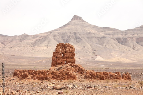 Ruins of clay building near Atlas mountains  Morocco