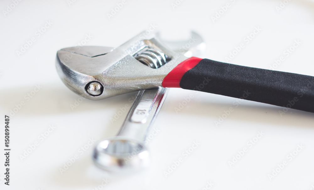 Wrench on wooden table Wrench on wooden table