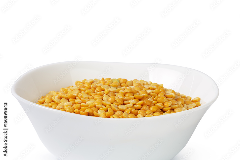 Dry yellow split peas isolated on white. Dry yellow split peas isolated on white.