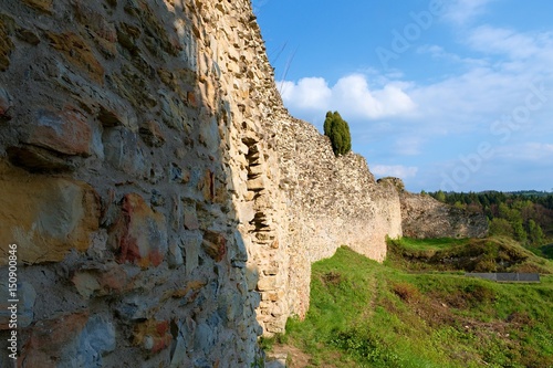 Ruins of fortification (bulwark). Medieval rampart © romannerud