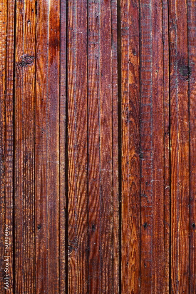 The brown wood texture with natural patterns The brown wood texture with natural patterns