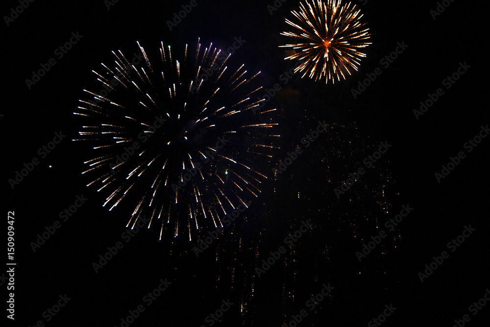 Bright lights of the salute against the black sky Bright lights of the salute against the black sky