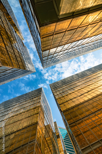 Hongkong, China, financial center. Building glass walls, looking up to the angle.