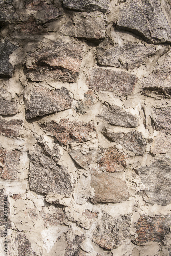 Fototapeta premium Wall of stone closeup as background