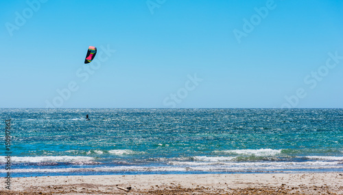 Kite surfing on a clear day
