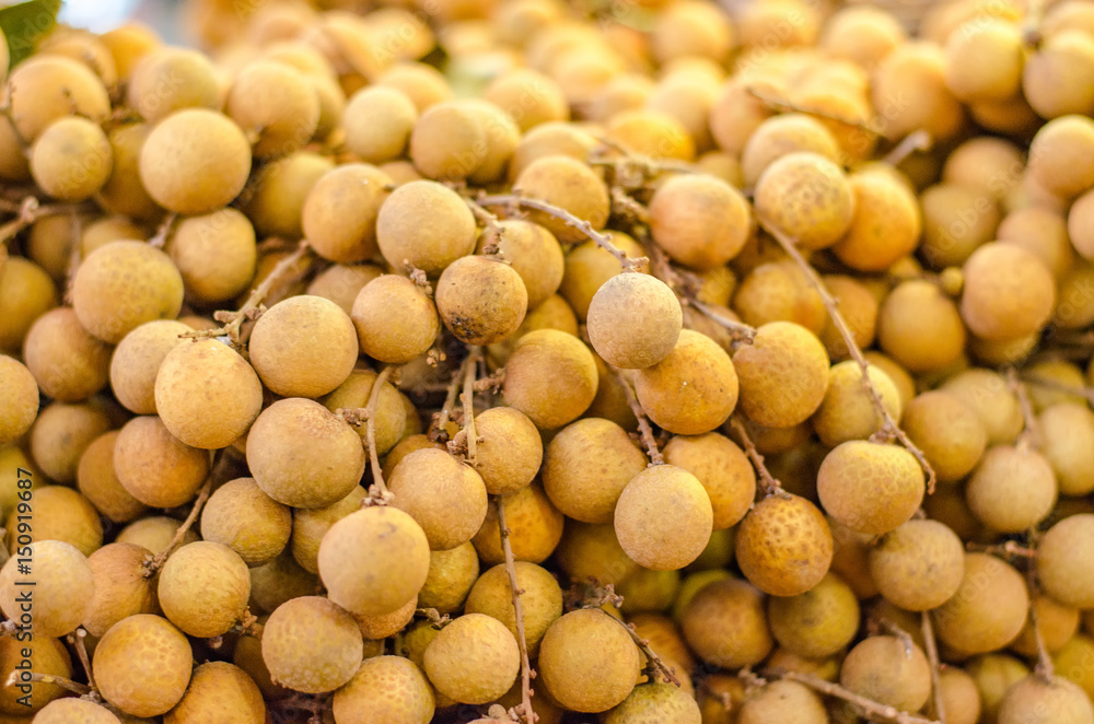Fresh longan fruit on market stall in Malaysia. Fresh longan fruit on market stall in Malaysia.