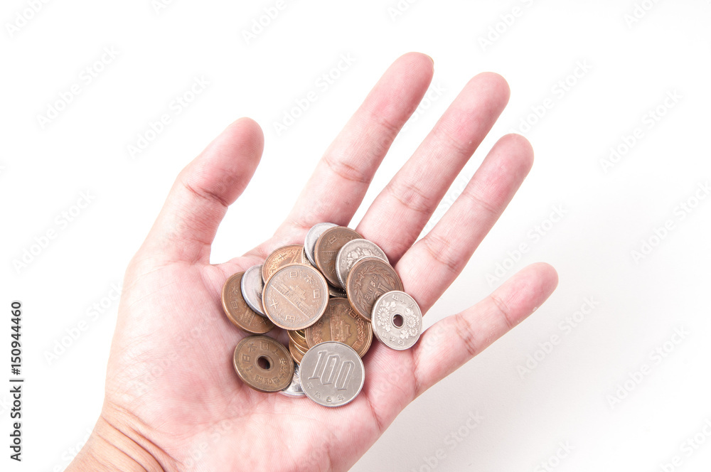 Japanese coin in hand. Japanese coin in hand.