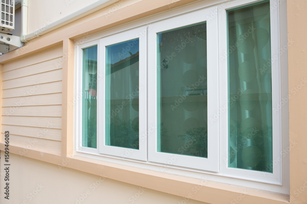 window with window blinds on wood walls. window with window blinds on wood walls.
