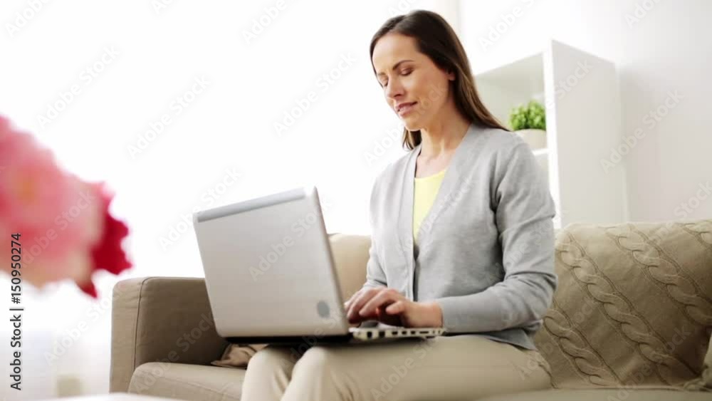 happy woman with laptop computer at home happy woman with laptop computer at home