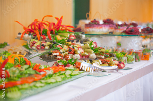 buffet, salads are on the table.